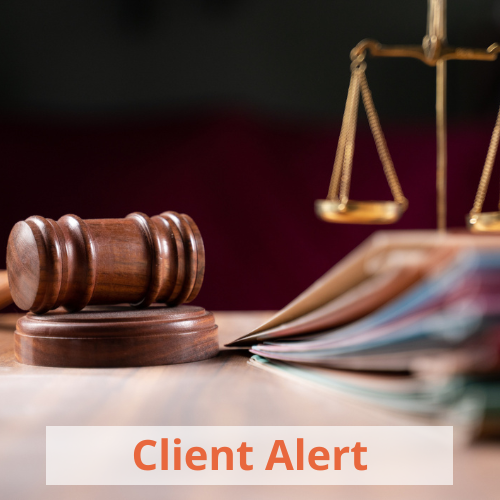 An image of a gavel and scales with "Client Alert" written across the bottom.